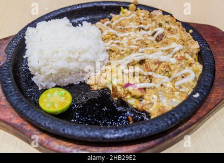 Sizzling sisig, typical meal of Philippines Stock Photo