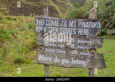 Wooden tourist information sign at Pinatubo volcano. Stock Photo