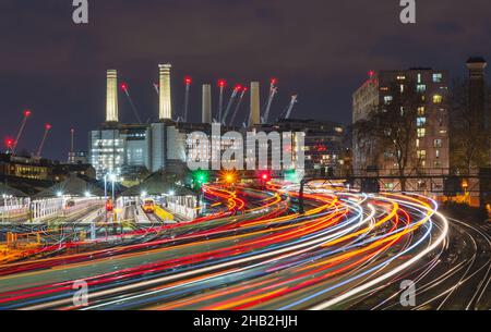 night time view of the railway and maintenance depots with the former Battersea power Station behind. taken from Edbury Bridge, London, England, UK Stock Photo