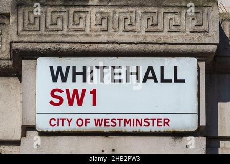 Whitehall road sign high on a wall close to Downing Street, London, England, UK Stock Photo