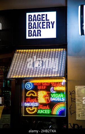 Neon sign at Bagel Bakery Bar in Soho, London, UK Stock Photo