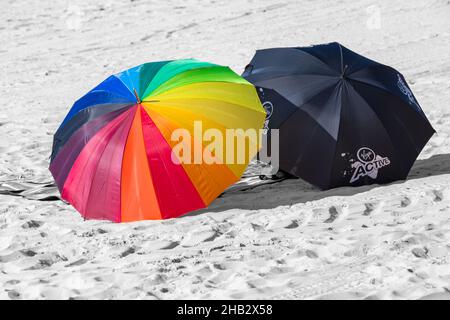 Colourful umbrellas on beach at Bournemouth, Dorset UK.in July Stock Photo