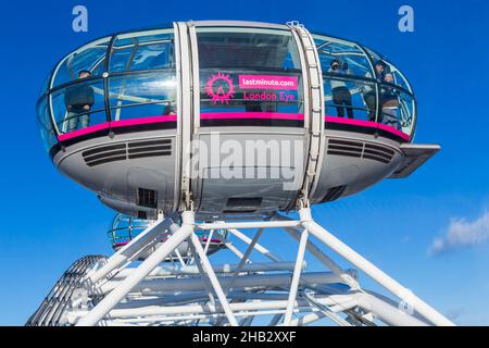 Visitors enjoying the views from London Eye pod at Southbank, London UK in December Stock Photo