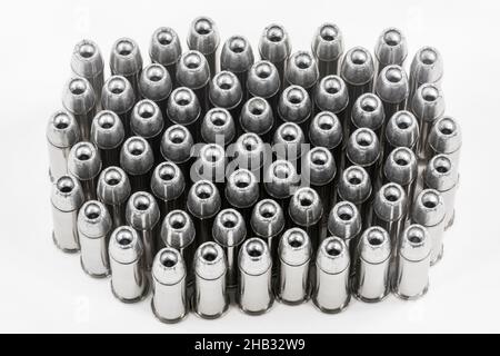 Close up view of 38 caliber hollow point bullets with white background. Stock Photo