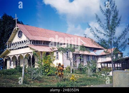 Colonial style wooden Our Lady of Montserrat Roman Catholic Church with red corrugated iron roof, Tortuga, Trinidad, photographed in 1963 built 1878 Stock Photo