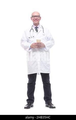 smiling doctor with a takeaway coffee. isolated on a white Stock Photo