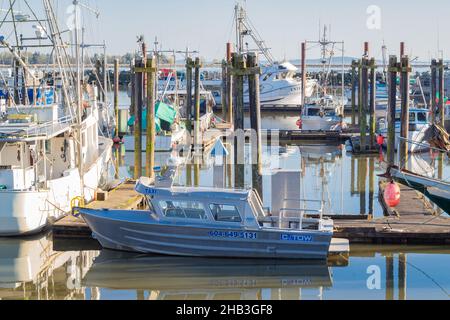 Fishing Boats in a harbor. A large number of fishing boats moored in the marina in Richmond BC Canada-April 18,2021. Street view, travel photo, select Stock Photo