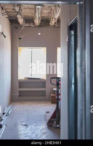 detail of a forklift truck in a room on a construction site Stock Photo