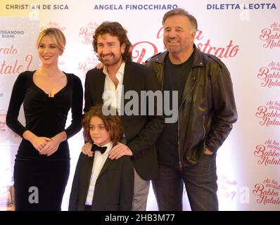 Naples, Italy. 16th Dec, 2021. Alessandro Siani, Christian De Sica and Diletta Leotta pose during a photocall session for the Christmas film 'Chi ha incastrato Babbo Natale?' at Happy MaxiCinema of Afragola in Naples, Italy. (Photo by Mariano Montella/Pacific Press) Credit: Pacific Press Media Production Corp./Alamy Live News Stock Photo