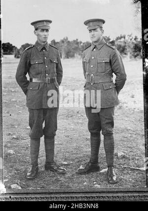 Copy of a portrait of two Riflemen of the New Zealand Rifle Brigade, inscribed McDougal, Berry & Co, copyist, 1915-1920, Wellington, black-and-white photography Stock Photo