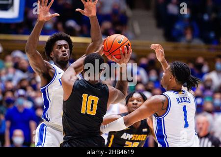 December 16, 2021: Duke Blue Devils center Mark Williams (15) and guard Trevor Keels (1) try to trap Appalachian State Mountaineers guard Michael Eads Jr. (10) during the first half of the NCAA basketball matchup at Cameron Indoor in Durham, NC. (Scott Kinser/Cal Sport Media) Stock Photo