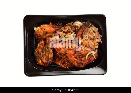 Top View of Tandoori Chicken in Disposable Container Isolated on White Background with Clipping Path Stock Photo