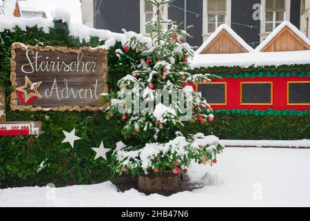 Styrian advent (Steirischer Advent), a beautiful Christmas market in the city center of Graz, Styria region, Austria, in a beautiful winter snowy day Stock Photo