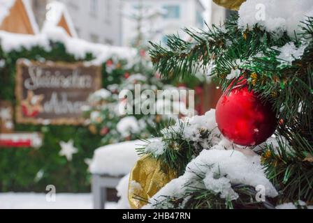 Styrian advent (Steirischer Advent), a beautiful Christmas market in the city center of Graz, Styria region, Austria, in a beautiful winter snowy day. Stock Photo