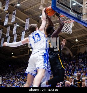 December 16, 2021: Duke Blue Devils forward Joey Baker (13) fouls Appalachian State Mountaineers forward James Lewis Jr. (25) as he goes up during the second half of the NCAA basketball matchup at Cameron Indoor in Durham, NC. (Scott Kinser/Cal Sport Media) Stock Photo