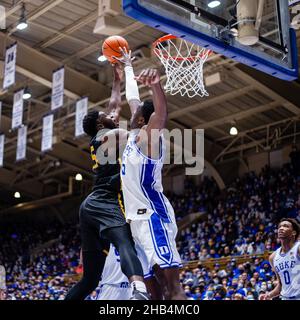 December 16, 2021: Appalachian State Mountaineers forward James Lewis Jr. (25) goes for a layup over Duke Blue Devils center Mark Williams (15) during the second half of the NCAA basketball matchup at Cameron Indoor in Durham, NC. (Scott Kinser/Cal Sport Media) Stock Photo