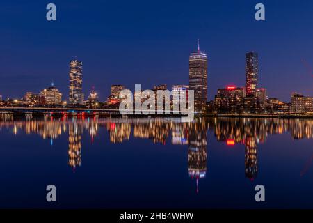 Boston Skyline refelction from the Cambridge side of the Charles River at twilight Stock Photo