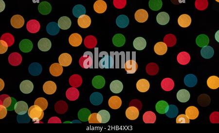 Color photo of blurred Christmas lights at night Stock Photo