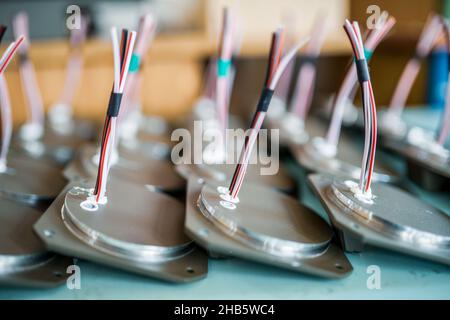 Pattern of details for TFT monitors on table in workshop Stock Photo