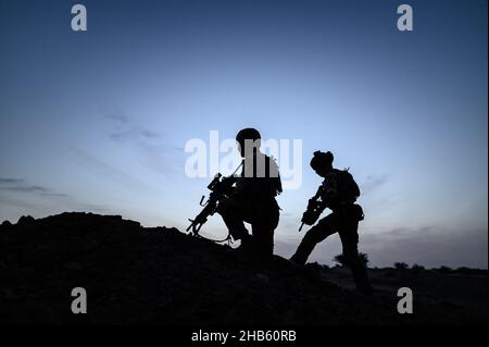 A platoon of the 3rd RIMA (naval infantry regiment), based in Vannes, Britany, and led by Lieutenant Geoffroy (27), patrols with the new 'Griffon' armored vehicle (deployed for the first time in a theater of operations) in the villages of Guintou, Bera and Seina, north of Gao, Mali on December 15, 2021. The patrol aims to contact with the population and villages chiefs, in particular, in order to ensure that the population is not threatened and to collect information on terrorists or bandits. France has been gradually retiring its troops from military bases in northern Mali and moving them to Stock Photo