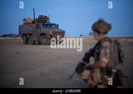 A platoon of the 3rd RIMA (naval infantry regiment), based in Vannes, Britany, and led by Lieutenant Geoffroy (27), patrols with the new 'Griffon' armored vehicle (deployed for the first time in a theater of operations) in the villages of Guintou, Bera and Seina, north of Gao, Mali on December 15, 2021. The patrol aims to contact with the population and villages chiefs, in particular, in order to ensure that the population is not threatened and to collect information on terrorists or bandits. France has been gradually retiring its troops from military bases in northern Mali and moving them to Stock Photo