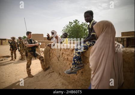 A platoon of the 3rd RIMA (naval infantry regiment), based in Vannes, Britany, and led by Lieutenant Geoffroy (27), patrols with the new 'Griffon' armored vehicle (deployed for the first time in a theater of operations) in the villages of Guintou, Bera and Seina, north of Gao, Mali on December 15, 2021. The patrol aims to contact with the population and villages chiefs, in particular, in order to ensure that the population is not threatened and to collect information on terrorists or bandits. France has been gradually retiring its troops from military bases in northern Mali and moving them to Stock Photo