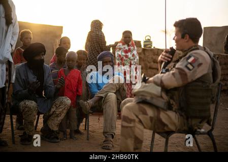 A platoon of the 3rd RIMA (naval infantry regiment), based in Vannes, Britany, and led by Lieutenant Geoffroy (27), patrols with the new 'Griffon' armored vehicle (deployed for the first time in a theater of operations) in the villages of Guintou, Bera and Seina, north of Gao, Mali on December 15, 2021. The patrol aims to contact with the population and villages chiefs, in particular, in order to ensure that the population is not threatened and to collect information on terrorists or bandits. France has been gradually retiring its troops from military bases in northern Mali and moving them to Stock Photo