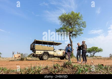 Tourists on a game drive, safari trip, among the wildlife of Kruger National Park, South Africa Stock Photo