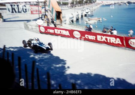 Formula 1 Monaco Grand Prix 14th May 1961, Jack Brabham in Cooper-Climax  tobacconist kiosk corner Stock Photo