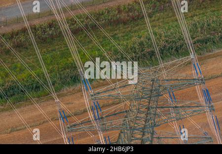 power lines and power pole from above, aerial view, Germany, Schleswig-Holstein, Hohenlockstedt Stock Photo