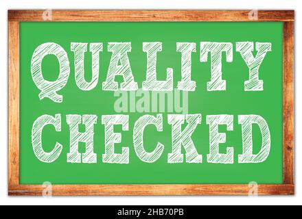 QUALITY CHECKED written on green wooden frame school blackboard Stock Photo