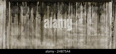 Texture of grey concrete wall with dark water and oil marks running vertically down and many marks and lines grundge Stock Photo