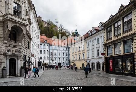 Ljubljana, Slovenia - 04 13 2018 people walking in the Streets of old Ljubljana during spring Stock Photo