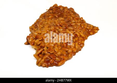 almonds caramelized prepare on restaurant kitchen isolate on white Stock Photo