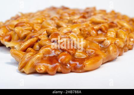 almonds caramelized prepare on restaurant kitchen isolate on white Stock Photo