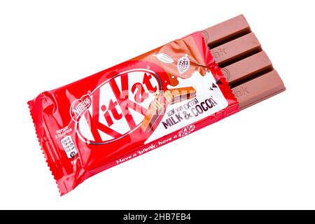 Ukraine, Kyiv - December 12. 2021: Opened Kit Kat chocolate bar. Kit Kat is a chocolate biscuit bar confection that is manufactured by Nestle isolated Stock Photo