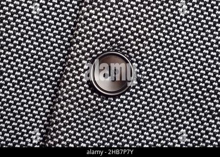 Closeup of Button on Tweed Blazer Stock Photo