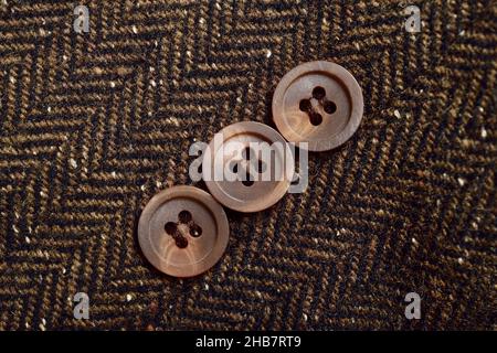 Button of herringbone fabric cloth Stock Photo