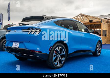 PONTIAC, MI/USA - SEPTEMBER 22, 2021: A 2021 Ford Mustang Mach-E SUV at Motor Bella, at the M1 Concourse, near Detroit, Michigan. Stock Photo