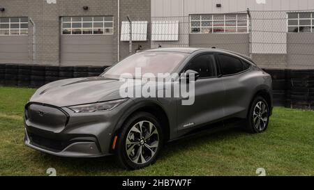 PONTIAC, MI/USA - SEPTEMBER 22, 2021: A 2021 Ford Mustang Mach-E SUV at Motor Bella, at the M1 Concourse, near Detroit, Michigan. Stock Photo