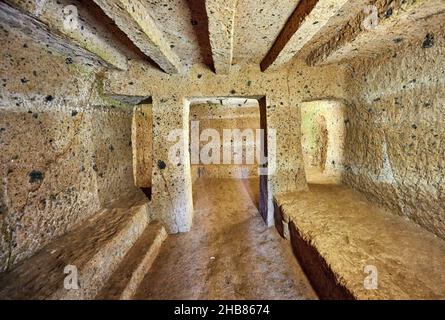 Interior of an Etruscan 'dado: (dice) tomb known as Tomba Maroi dating form the 7th century BC, Necropoli della Banditaccia, Cerveteri, Italy. A UNESC Stock Photo