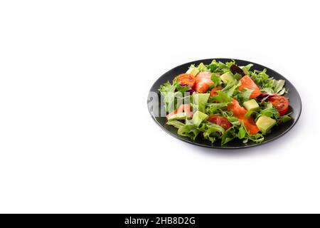 Salmon and avocado salad isolated on white background Stock Photo