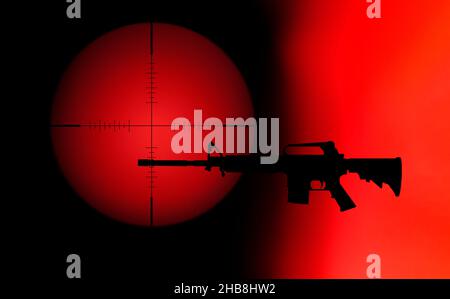 Target crosshair with AR-15 rifle against red and black background Stock Photo