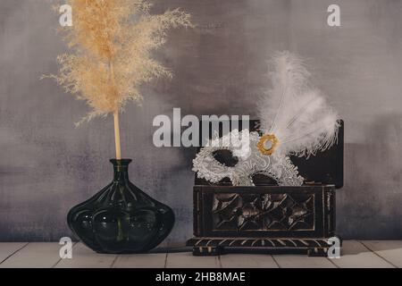 female carnival mask with glittering background whith shadows. Stock Photo