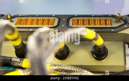 Modern electronic device for relay protection testing and commissioning closeup. Power cable connections. Stock Photo