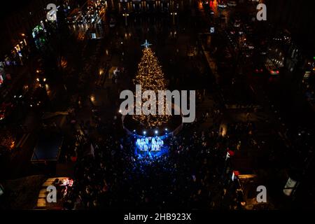 Lviv, Ukraine - December 17, 2021: Opening of Christmas tree near Opera House in Lviv, Ukraine. View from drone Stock Photo