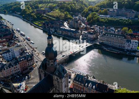 Dinant, Belgium - October 10 2019: Beautiful city Dinant with church and bridge and famous for sax Stock Photo