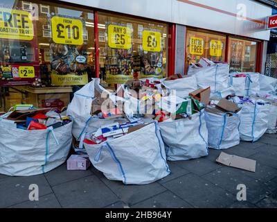 London. UK-12.10.2021. A huge pile of packaging materials for recycling outside a branch of Iceland supermarket. Stock Photo