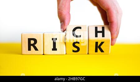 Take a risk and getting rich concept. Hand turns dice and changes the ...