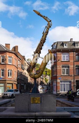 Dinant, Belgium - October 10 2019: Vertical view of saxophone monument on the street. Stock Photo